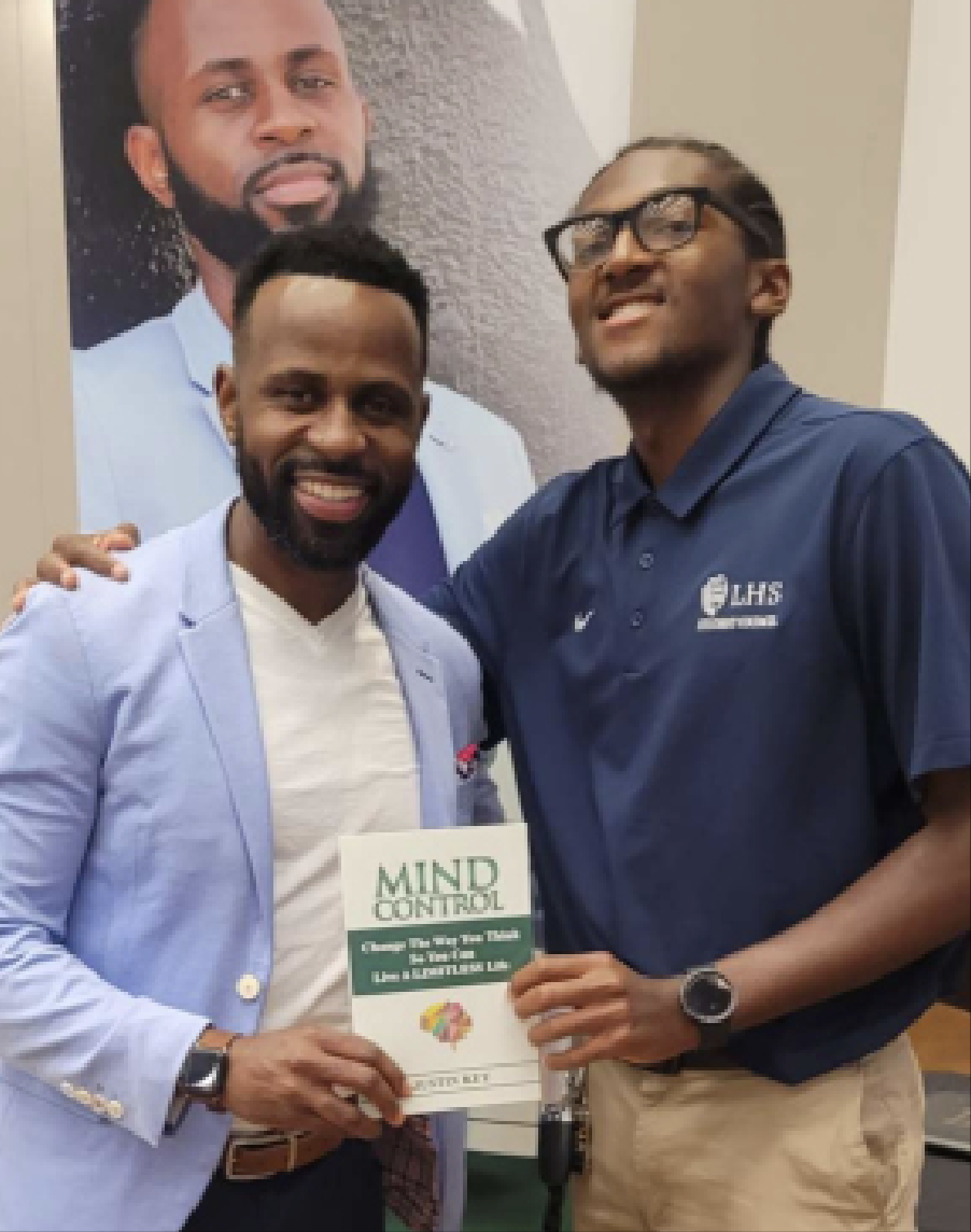 Key Stands With Dominic Mitchell '25 At The HBCU College Fair